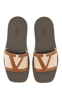 Valentino men’s viva superstar slide sandal in brown and beige leather with woven mesh design and iconic v logo