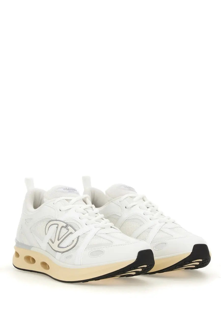 Valentino men’s vlogo easyjog sneaker white athletic shoe with silver logo detailing and beige air-cushioned sole