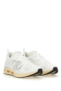 Valentino men’s vlogo easyjog sneaker white athletic shoe with silver logo detailing and beige air-cushioned sole