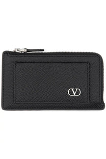 Black textured leather zippered card case with silver-tone Valentino logo emblem from Valentino men’s Vlogo collection
