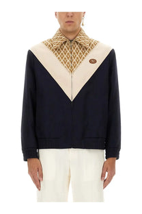 Valentino men’s wool bomber jacket in navy blue and cream with geometric patterned collar and Valentino logo