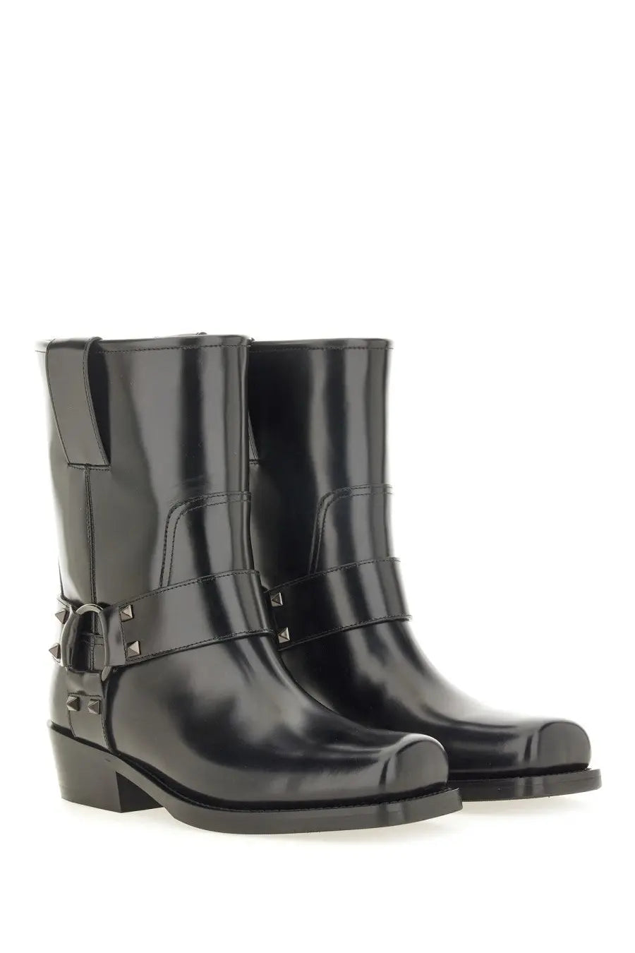 Valentino women’s black patent leather ankle boots with silver metal buckles and stud detailing
