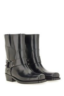 Valentino women’s black patent leather ankle boots with silver metal buckles and stud detailing