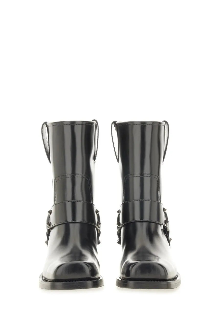 Valentino women’s black patent leather ankle boots with glossy finish and decorative metal buckles