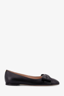 Valentino women’s black patent leather flat ballerina shoe with satin bow at the toe
