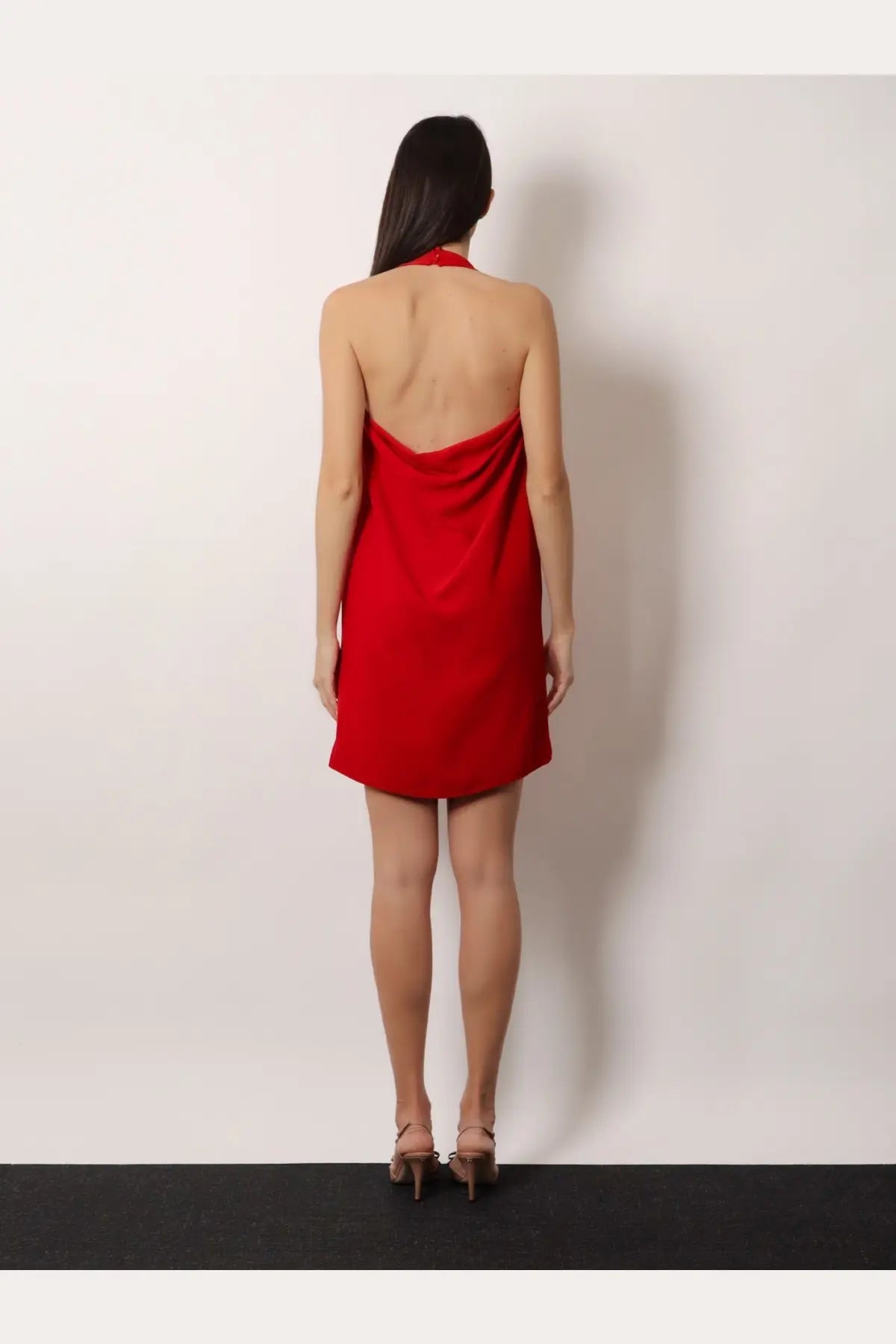Valentino women’s red cady couture halter-neck mini dress with draped back and smooth fabric shown from the back