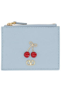 Light blue leather Valentino women’s card case with red cherry embellishments and gold-tone logo detail