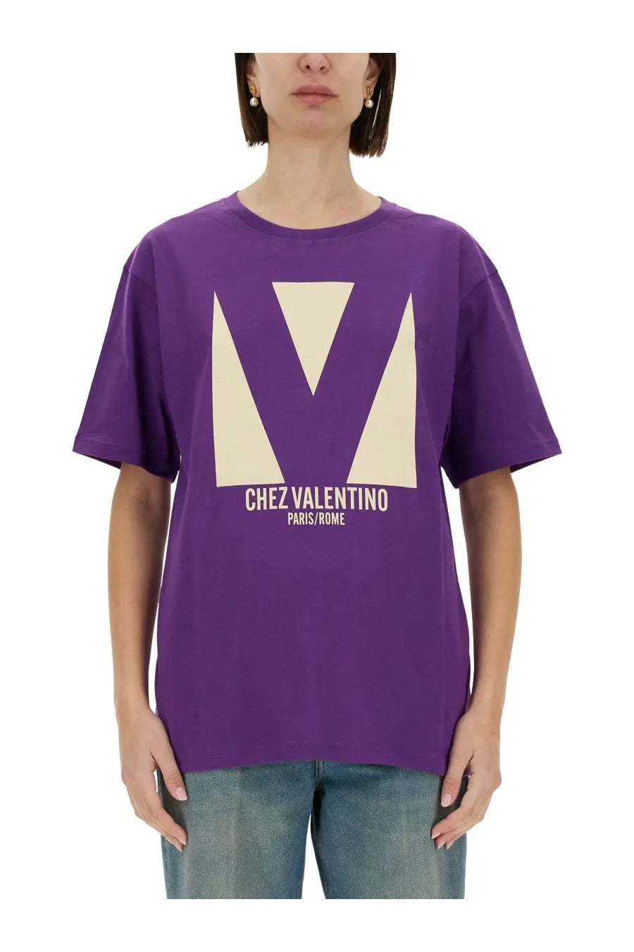 Valentino women’s purple Chez Valentino print t-shirt with large cream geometric V logo and paris Rome text below