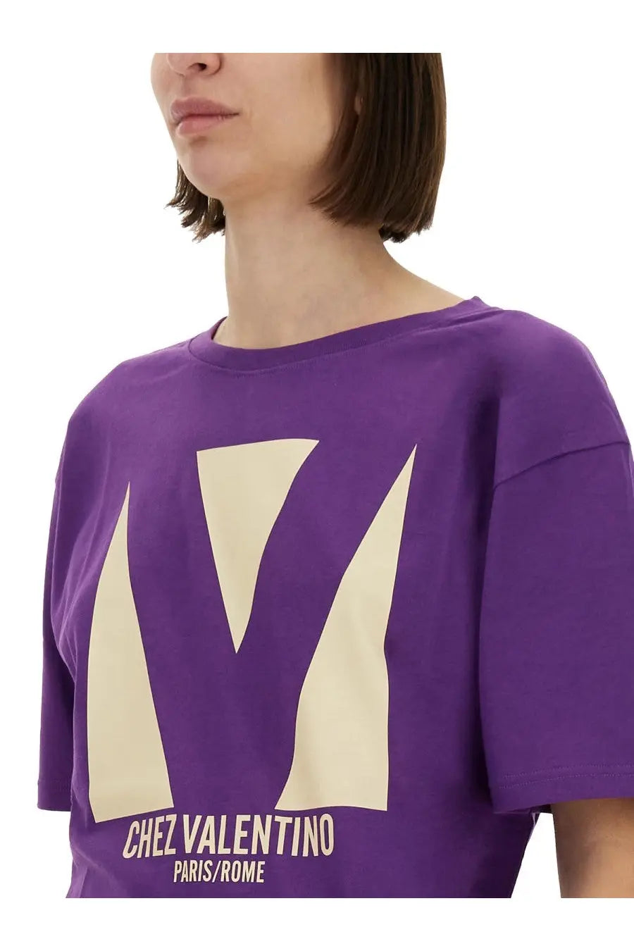 Valentino women’s purple Chez Valentino print t-shirt with large cream v logo and matching cream lettering on front