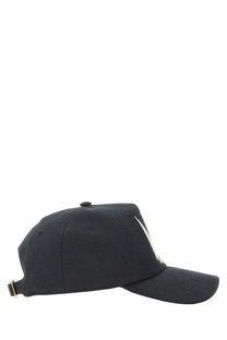 Valentino women’s chez valentine black baseball hat with white logo on side and gold-colored hardware details