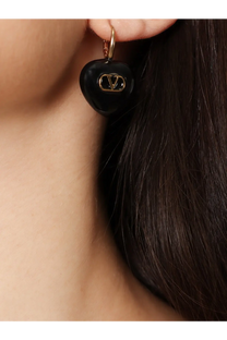 Black heart-shaped metal earring with gold-tone Valentino logo from Valentino women’s Coeur royal collection