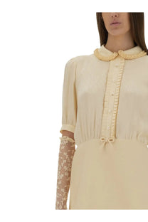 Valentino women’s cream-colored crepe couture short dress with ruffled collar and lace-trimmed sleeves