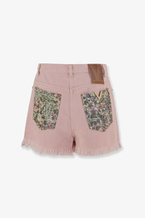 Back view of valentino women’s pink denim shorts with floral patterned pockets and frayed hems