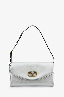 Valentino women’s devain silver metallic leather shoulder bag with gold-tone vlogo clasp and black strap