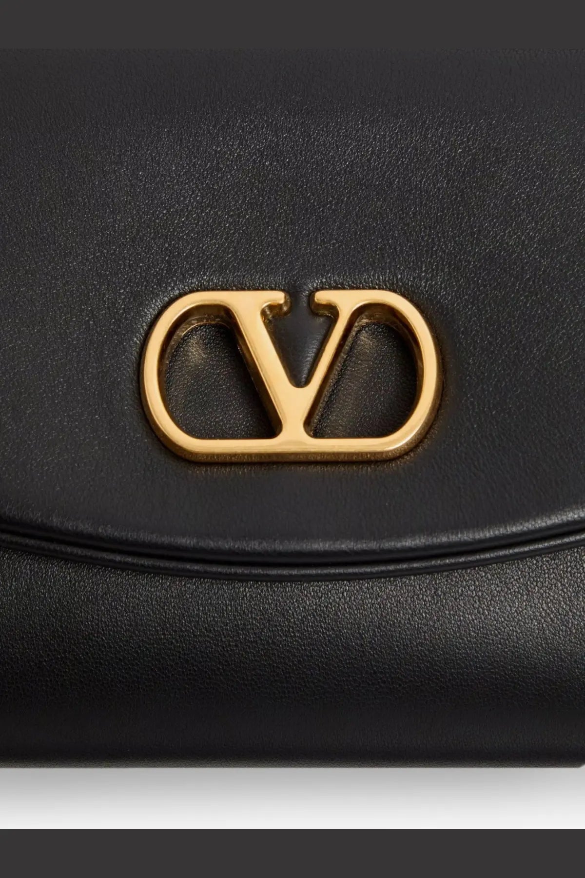 Black leather valentino women’s devain shoulder bag with gold-tone logo clasp and clutch design