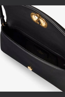 Valentino women’s Devain black leather shoulder bag with gold-tone hardware and distinctive logo clasp