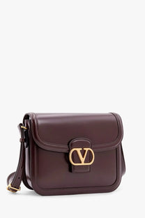 Valentino womens 9TO5 brown leather crossbody bag with burgundy finish gold-tone logo clasp and adjustable strap