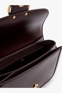 Valentino women’s Valentino Garavani 9TO5 leather shoulder bag in dark brown with gold hardware and structured interior