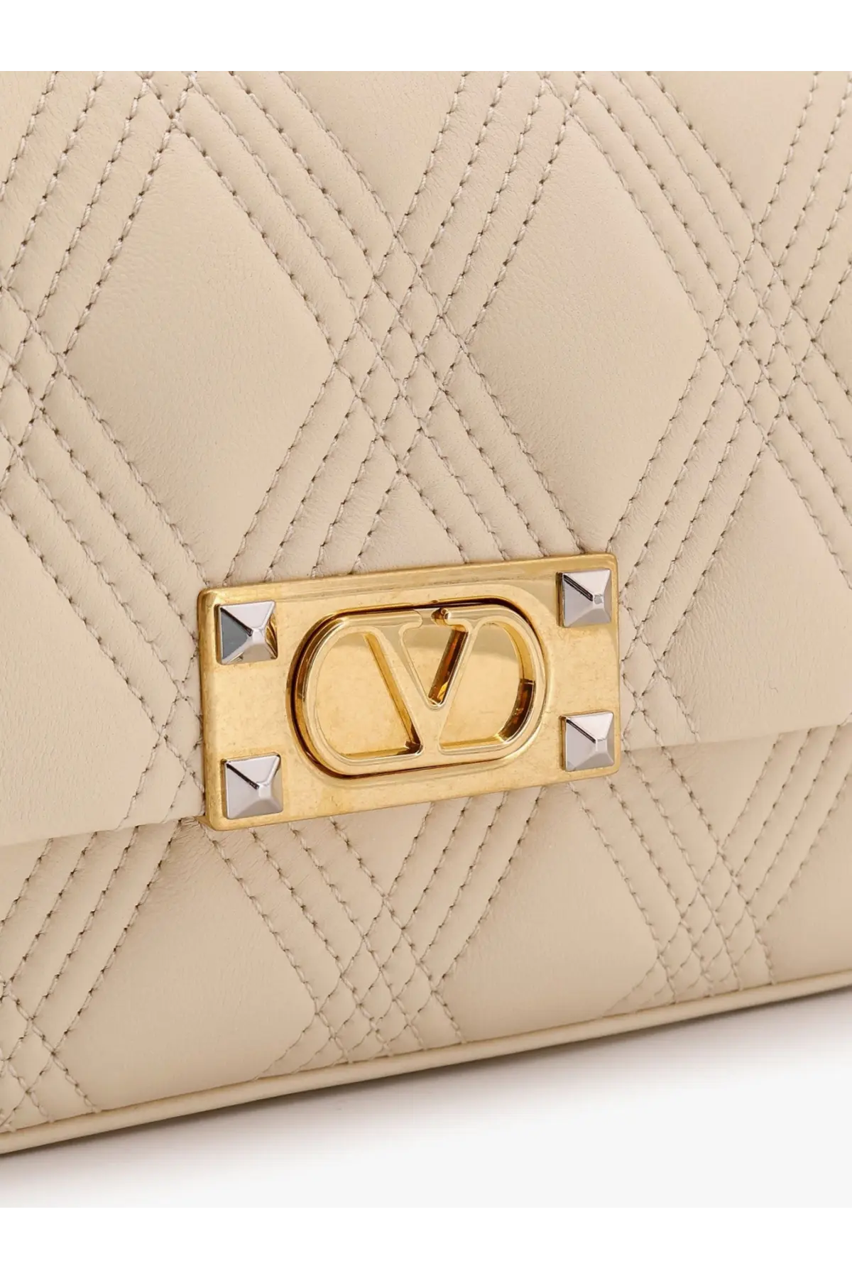 Cream-colored quilted leather medium shoulder bag with gold-tone clasp and silver studs by Valentino Garavani