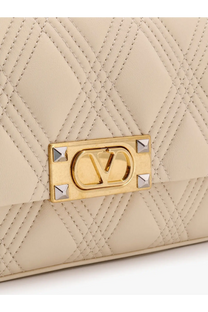 Cream-colored quilted leather medium shoulder bag with gold-tone clasp and silver studs by Valentino Garavani