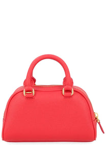 Valentino women’s mini bauletto vlogo signature satchel in vibrant coral-red textured leather with gold hardware and rounded handles