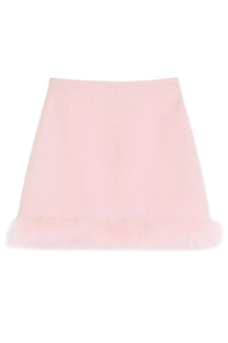 Valentino women’s soft pink mini skirt with plush fluffy hemline contrasting the blue product title