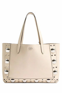 Valentino women’s Nellcôte shopping bag in white cream leather with silver-toned circular studs on sides and bottom