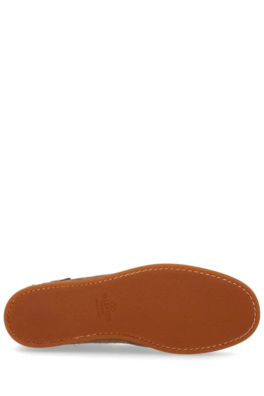 Tan leather sole of valentino women’s palm avenue loafer beige with visible stitching and embossed brand logo