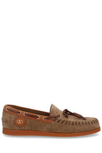 Valentino women palm avenue loafer beige tan suede slip-on moccasin with brown leather accents braided tassel and gold logo plaque