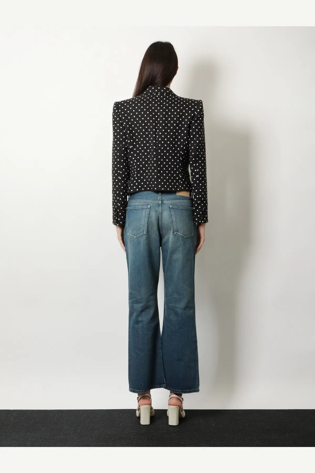 Valentino women’s black viscose blazer with white polka dots featuring structured shoulders and tailored fit