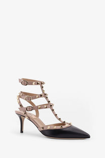 Valentino women’s rockstud leather pointed-toe high heel in black with tan suede straps and gold pyramid studs