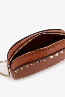 Valentino women’s brown leather crossbody shoulder bag with gold-tone pyramid studs and matching chain strap