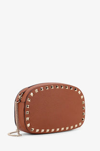 Valentino women’s rockstud brown leather shoulder bag with gold-tone pyramid studs and matching chain strap