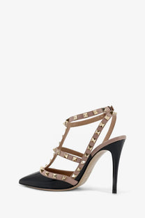 Valentino women’s rockstud patent leather pump in black with beige suede and gold-tone pyramid studs
