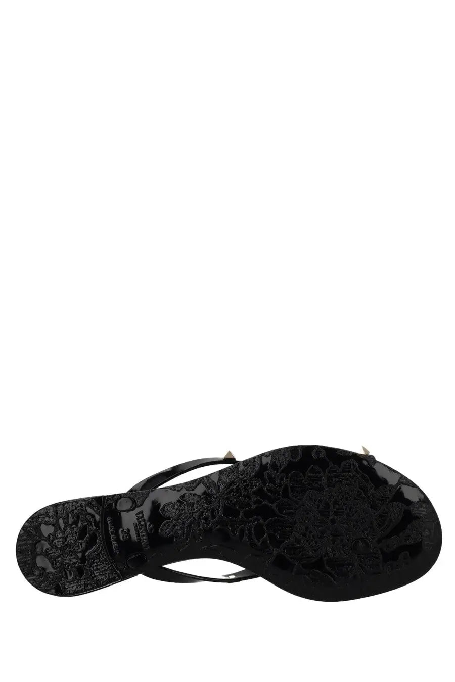 Valentino women’s black glossy rubber flip-flop with embossed floral pattern and metallic studs on the strap
