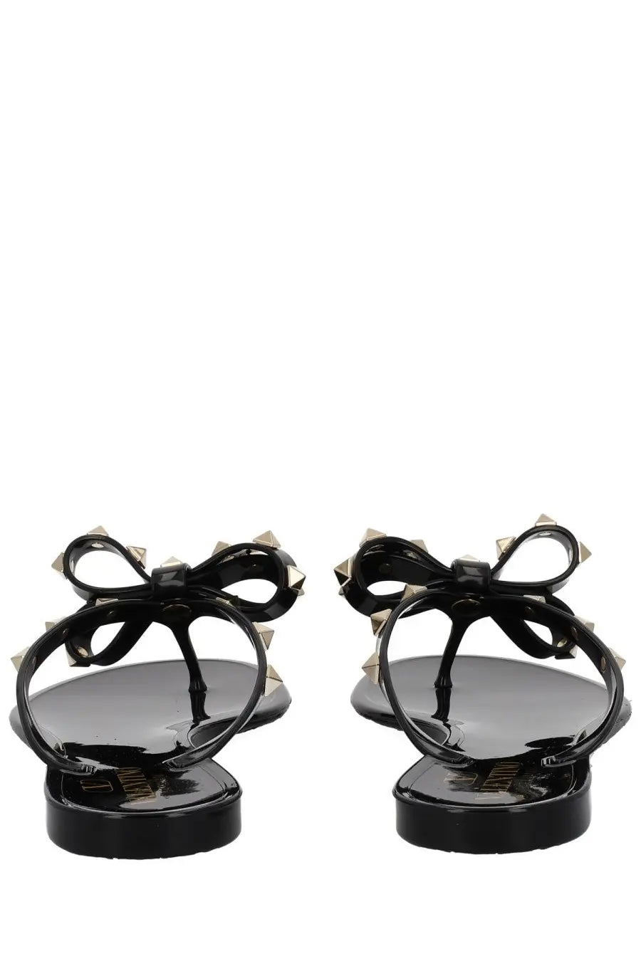 Valentino women’s rockstud black rubber flip-flops with silver-tone pyramid studs on bow-adorned straps