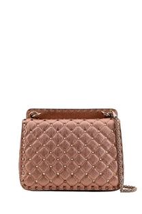 Valentino women’s rockstud spike bag in rose gold quilted leather with metallic studs and chain strap