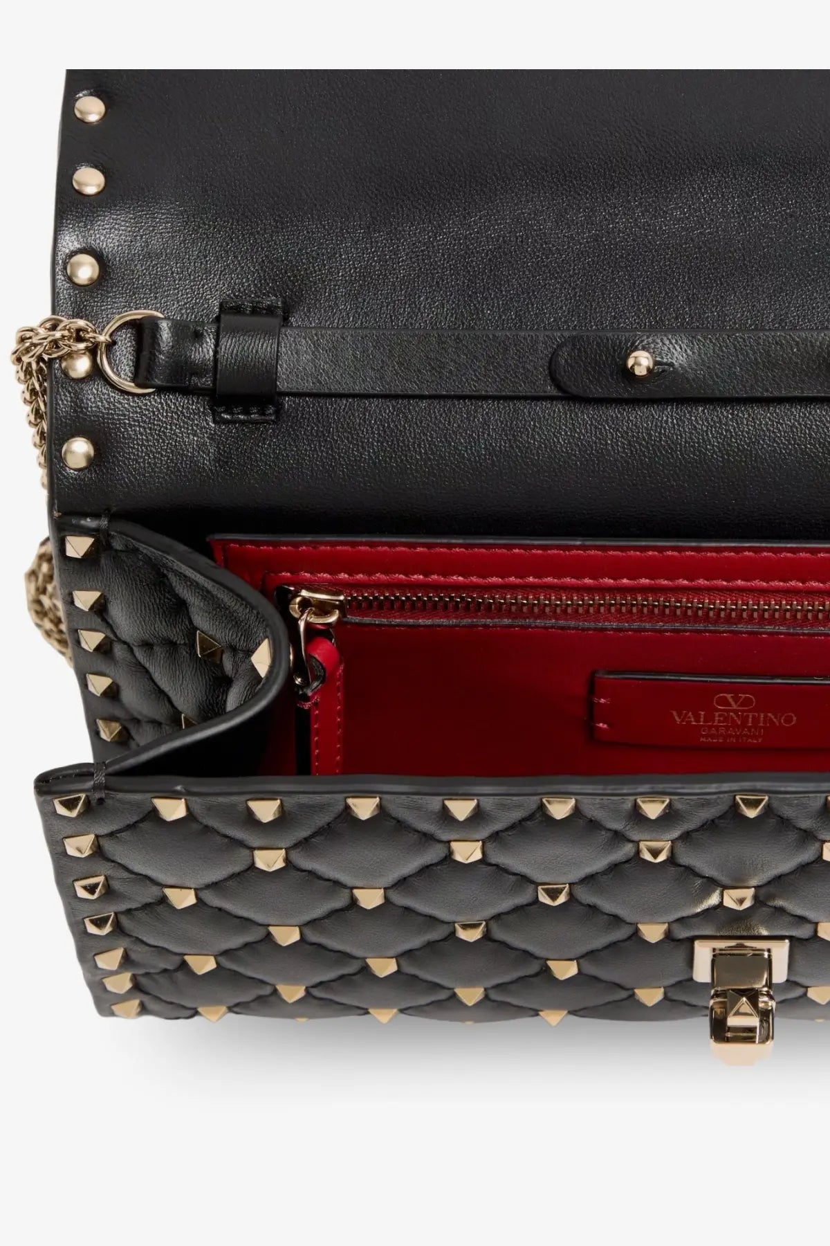 Valentino women’s black quilted leather rockstud spike crossbody bag with gold-tone studs and red interior lining