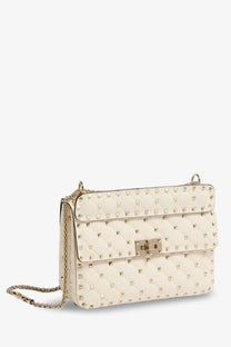 Valentino women’s rockstud spike cream leather crossbody bag with quilted texture gold-tone studs and chain strap