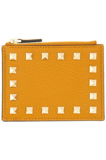 Valentino womens rockstud wallet orange mustard yellow leather card case with gold-tone square studs along edges