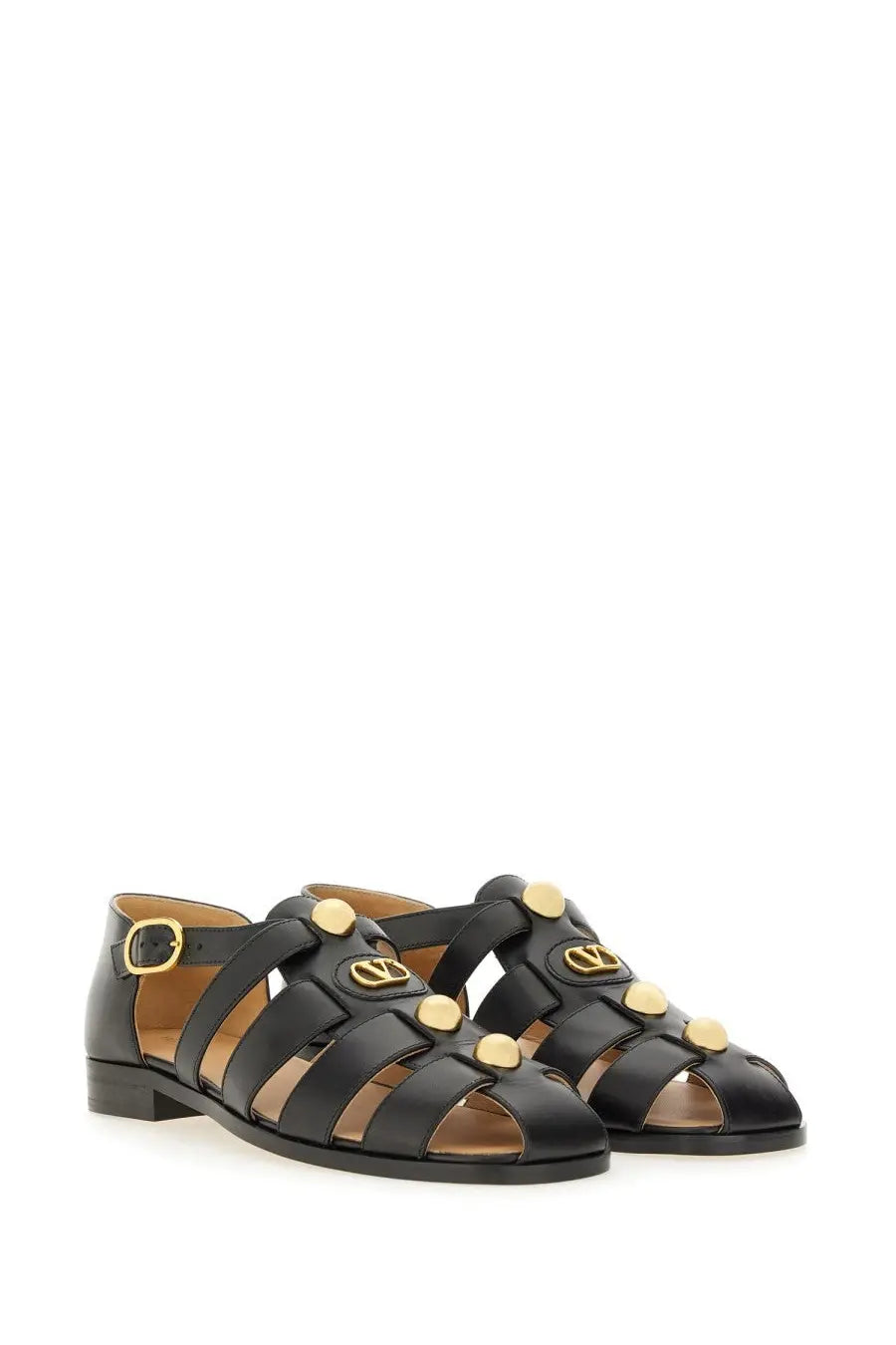Valentino women’s black leather fisherman’s sandal with gold tone circular studs and vlogo signature buckle