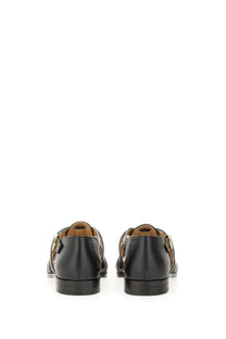 Black leather loafers with gold-tone buckle details from valentino womens sandal fisherman vlog signature black collection