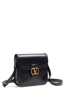 Black leather Valentino Garavani V-logo crossbody bag with gold-tone hardware for women shoulder use