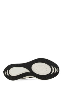 Valentino women’s sneaker vlogoeasyjog white sole with black and white modern design and oval-shaped logo in center