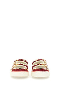 Valentino women’s red velvet slide sandals with gold-tone buckles colorful gemstones on white platform sole
