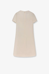 Beige short-sleeved a-line mini dress with simple back zipper made of virgin wool and silk by Valentino
