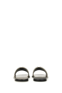 Valentino women’s viva superstar slide sandal black leather with sleek minimalist design and subtle metallic trim