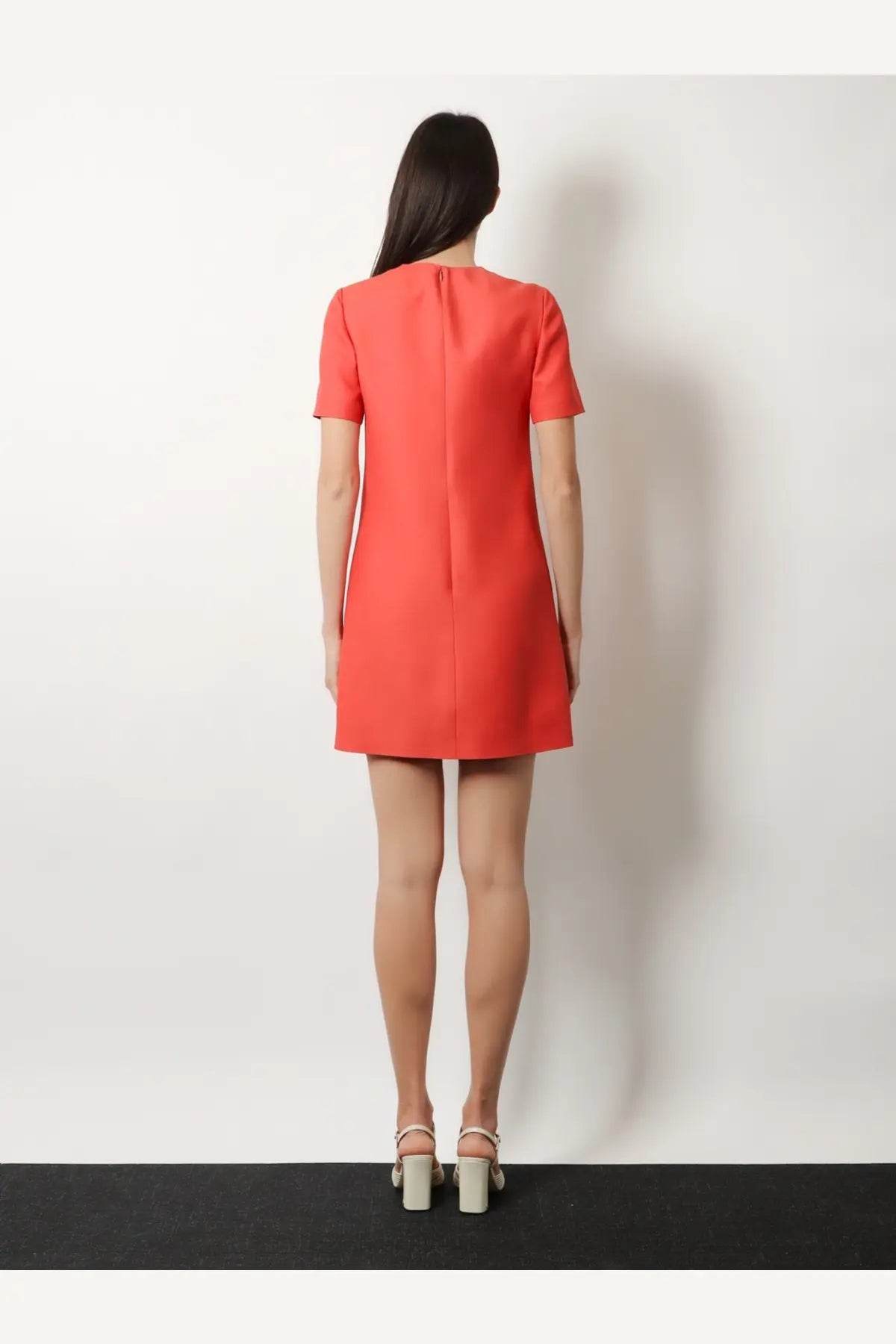 Back view of valentino womens wool and silk blend coral short sleeved a-line dress with central seam