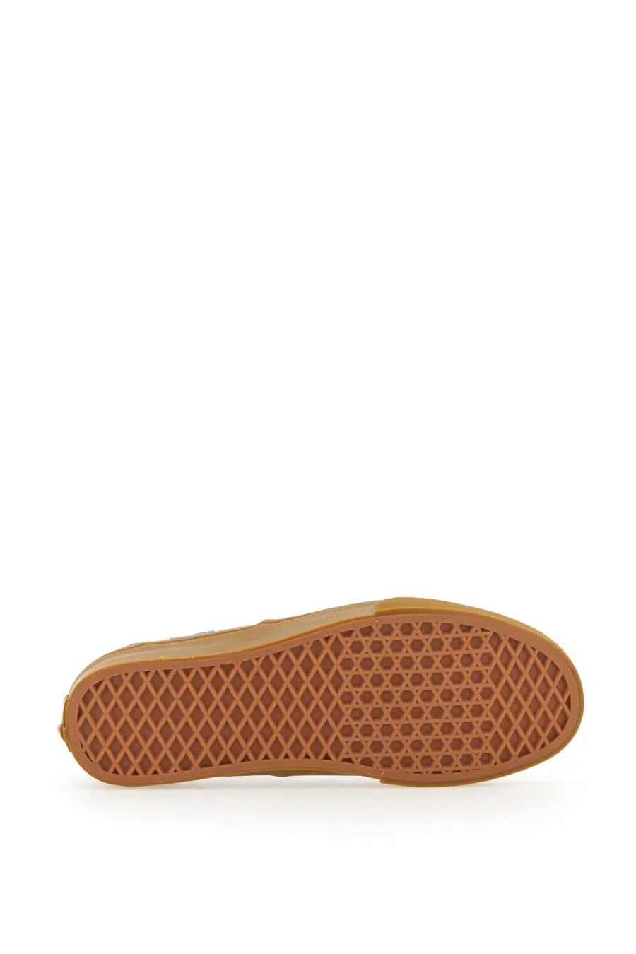 Tan rubber sole with distinctive diamond patterned tread design on vans men’s authentic sneaker white