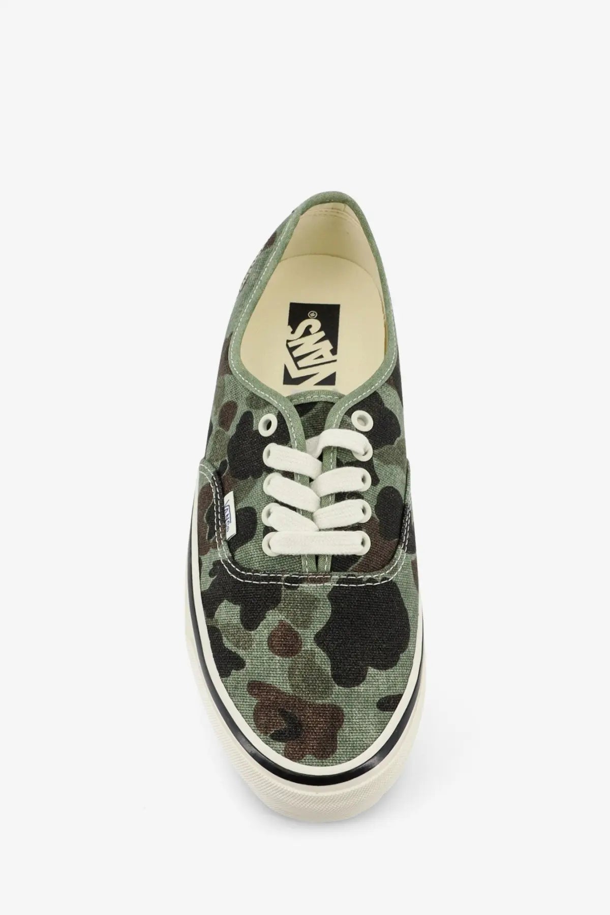 Vans men’s lx authentic canvas sneaker in green camouflage with white laces and classic rubber sole